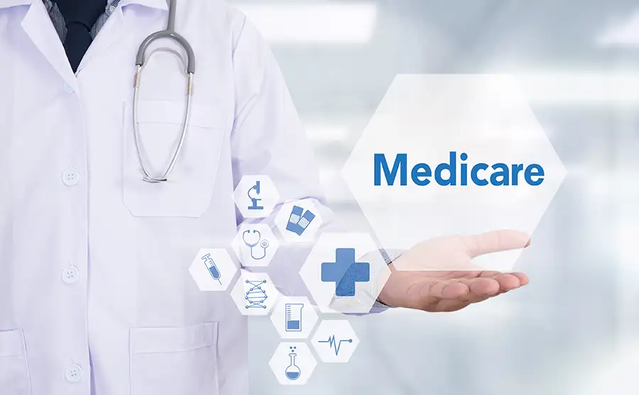 doctor discussing different types/parts of medicare options - Collinsville, IL St. Louis Metro East