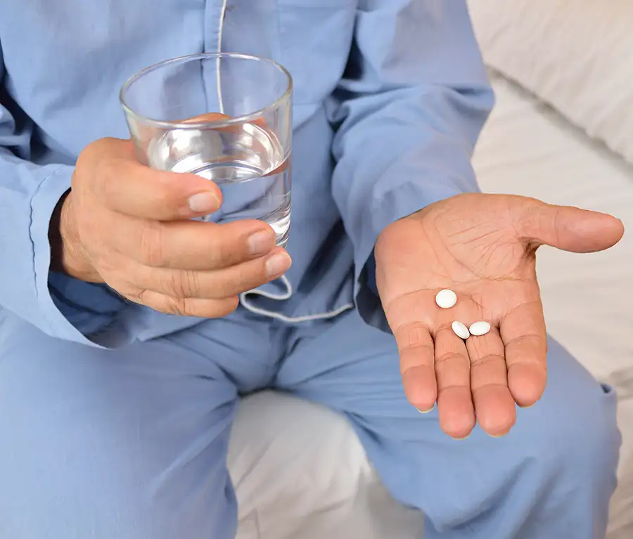 Older man in his 60s, taking medication, Medicare Part D helps with prescription medication - Collinsville, IL St. Louis Metro East